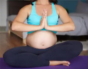 zwangere vrouw yoga